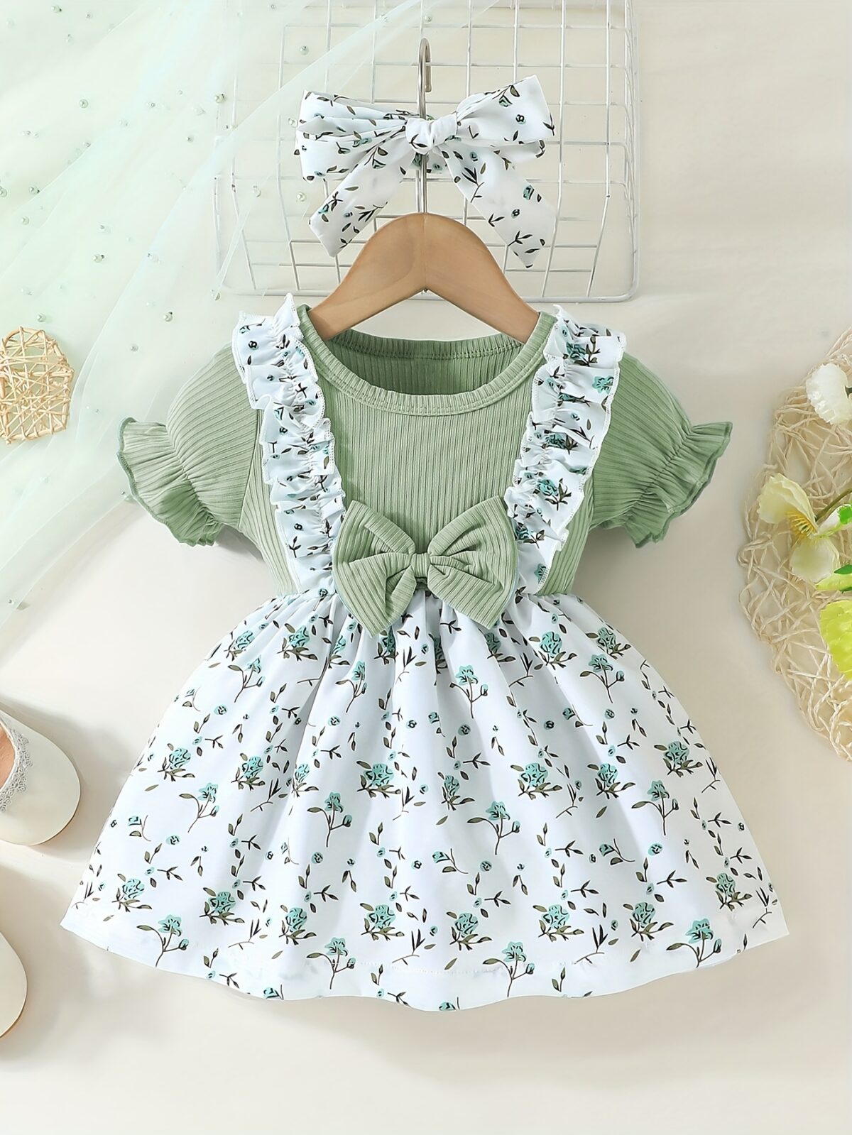 Adorable baby girl wearing a lightweight Summer Meadow floral print dress perfect for casual summer outings