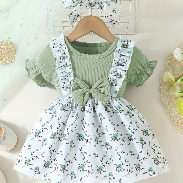 Adorable baby girl wearing a lightweight Summer Meadow floral print dress perfect for casual summer outings