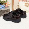 Adorable baby boy wearing stylish and comfortable Newness Little Gentleman shoes
