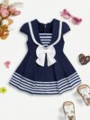 Adorable summer sailor stripe baby girl dress perfect for parties or everyday wear