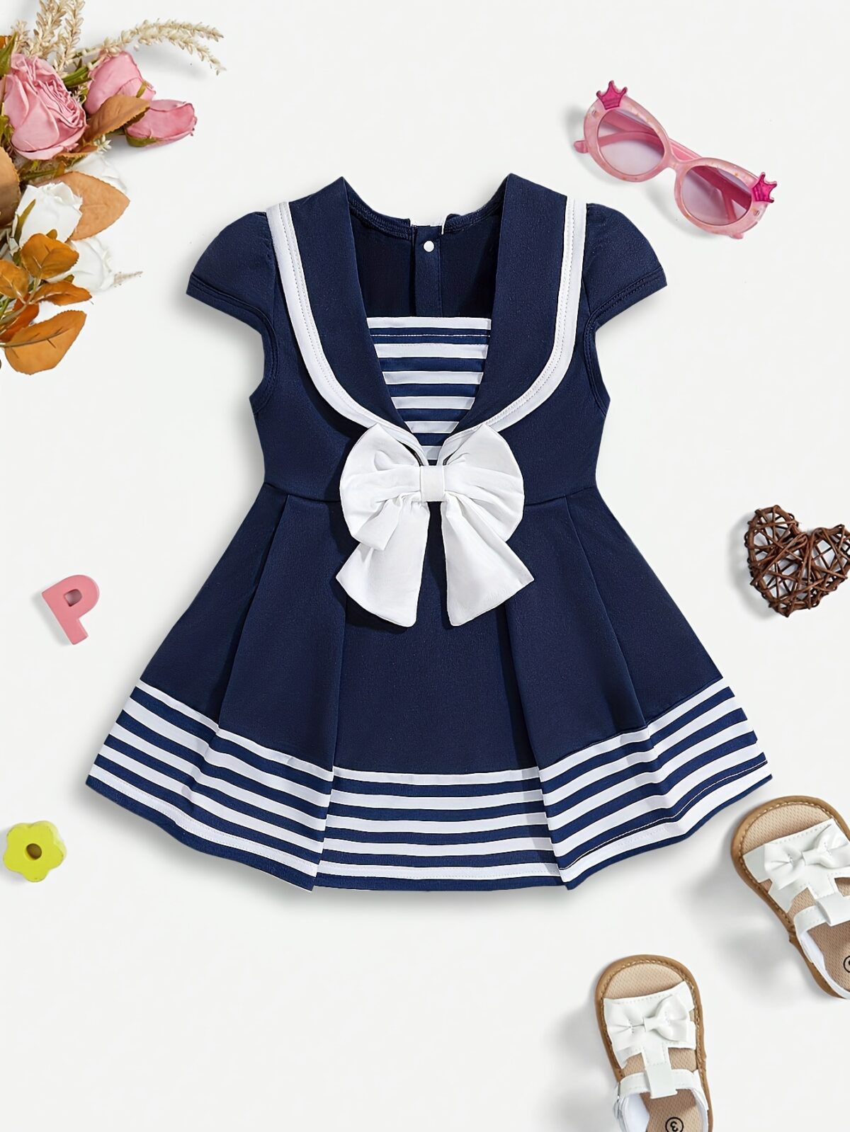 Adorable summer sailor stripe baby girl dress perfect for parties or everyday wear