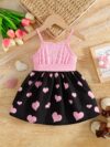 Sweetheart Summer Toddler Dress   Adorable little girl wearing a charming pink and white summer dress perfect for summer parties and outdoor play
