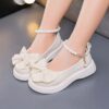 Adorable Princess Bow  Pearl Girls Mary Janes in white perfect for weddings parties and casual wear