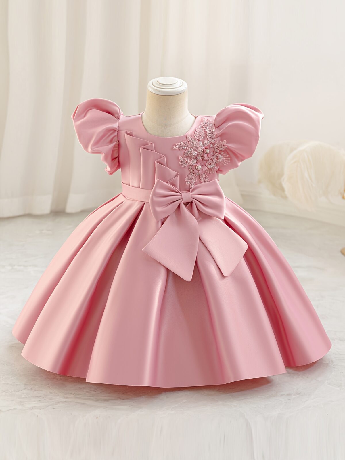 Adorable girl twirling in a lavender colored party dress perfect for birthdays and special occasions The dress features exquisite detailing and a flattering silhouette