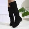 Newness Slouchy Suede Mid Calf Boots in rich brown suede leather showcasing the comfortable slouchy fit and mid calf height Perfect for adding a touch of effortless chic to any winter outfit