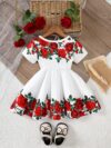 Adorable baby girl wearing a Rosalind floral print dress from Newness The dress features a charming floral pattern and is perfect for special occasions or everyday wear