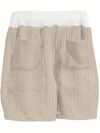 Newness Effortless Knit Summer Set A luxurious knit two piece set perfect for summer Model wears a relaxed fit knit top and matching skirt in a soft summery color