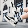 Newness Velocity Graphic Platform Shoes Trendy platform shoes in a vibrant graphic print perfect for spring and fall Features comfortable cushioning and a stylish elevated sole