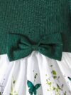 Adorable baby girl wearing a charming butterfly print dress from Newness perfect for spring and summer