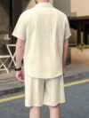 Newness Riviera Breeze Mens Summer Set A stylish two piece outfit in breathable polyester perfect for summer Model showcases the modern fit and comfort