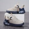 Stylish boys retro sneakers in white with colorful tassels perfect for everyday wear