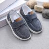 Stylish and comfortable blue canvas shoes for boys perfect for everyday wear The shoes feature a classic design with a touch of modern style