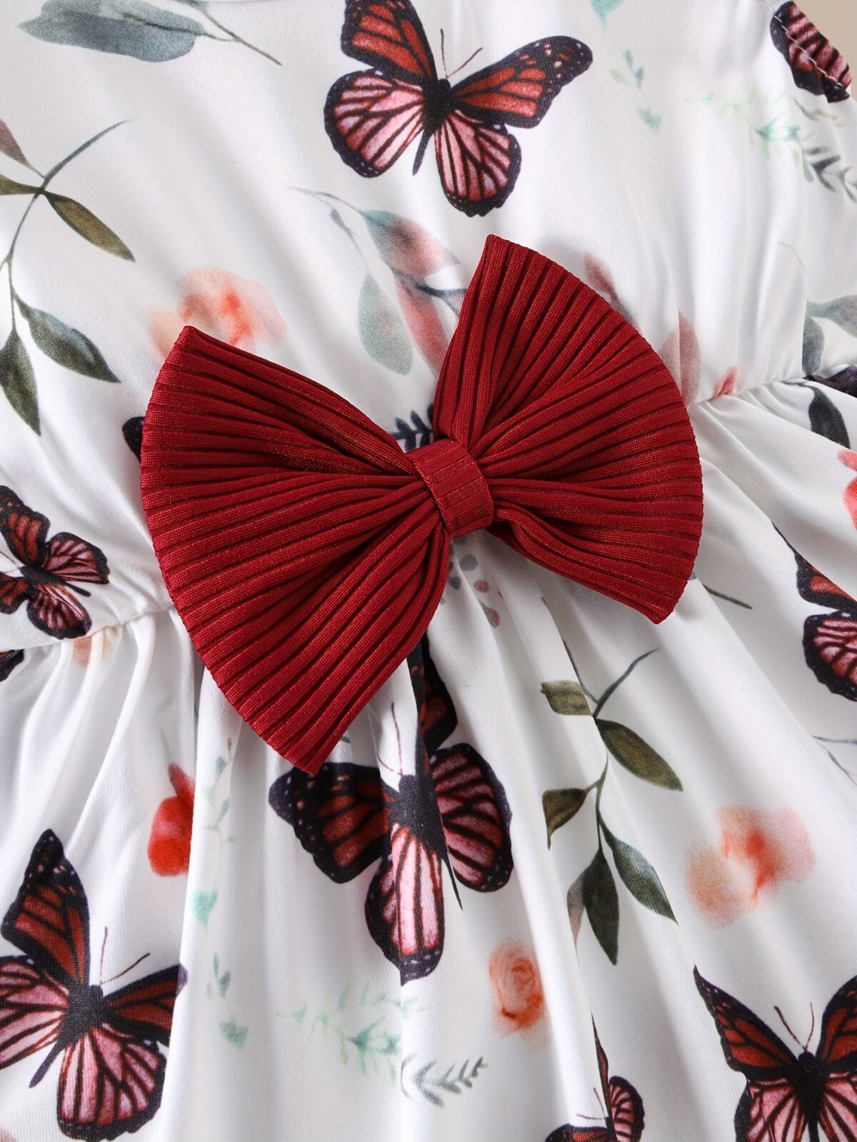 Adorable Flutterby Dreams Butterfly Dress for babies and toddlers showcasing its stylish and comfortable design The dress features a charming butterfly print