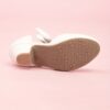 Enchanted Bow Girls White Heels by Newness Stylish and comfortable white heels with a charming bow detail perfect for any occasion