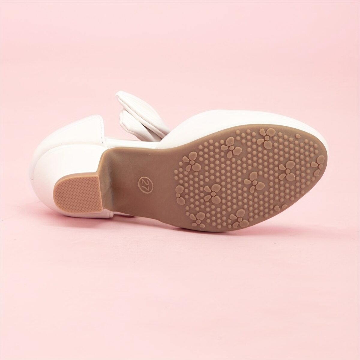 Enchanted Bow Girls White Heels by Newness Stylish and comfortable white heels with a charming bow detail perfect for any occasion