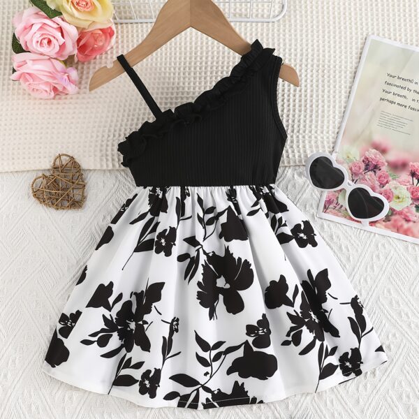 Adorable girl wearing a vibrant Summer Bloom floral print dress perfect for summer vacations