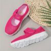 Adorable toddler wearing Newnesss Summer Breeze Sneakers running playfully outdoors on a sunny day