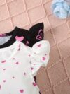 Adorable summer baby girl dress in a delightful heart and animal print Perfect for sunny days and special occasions