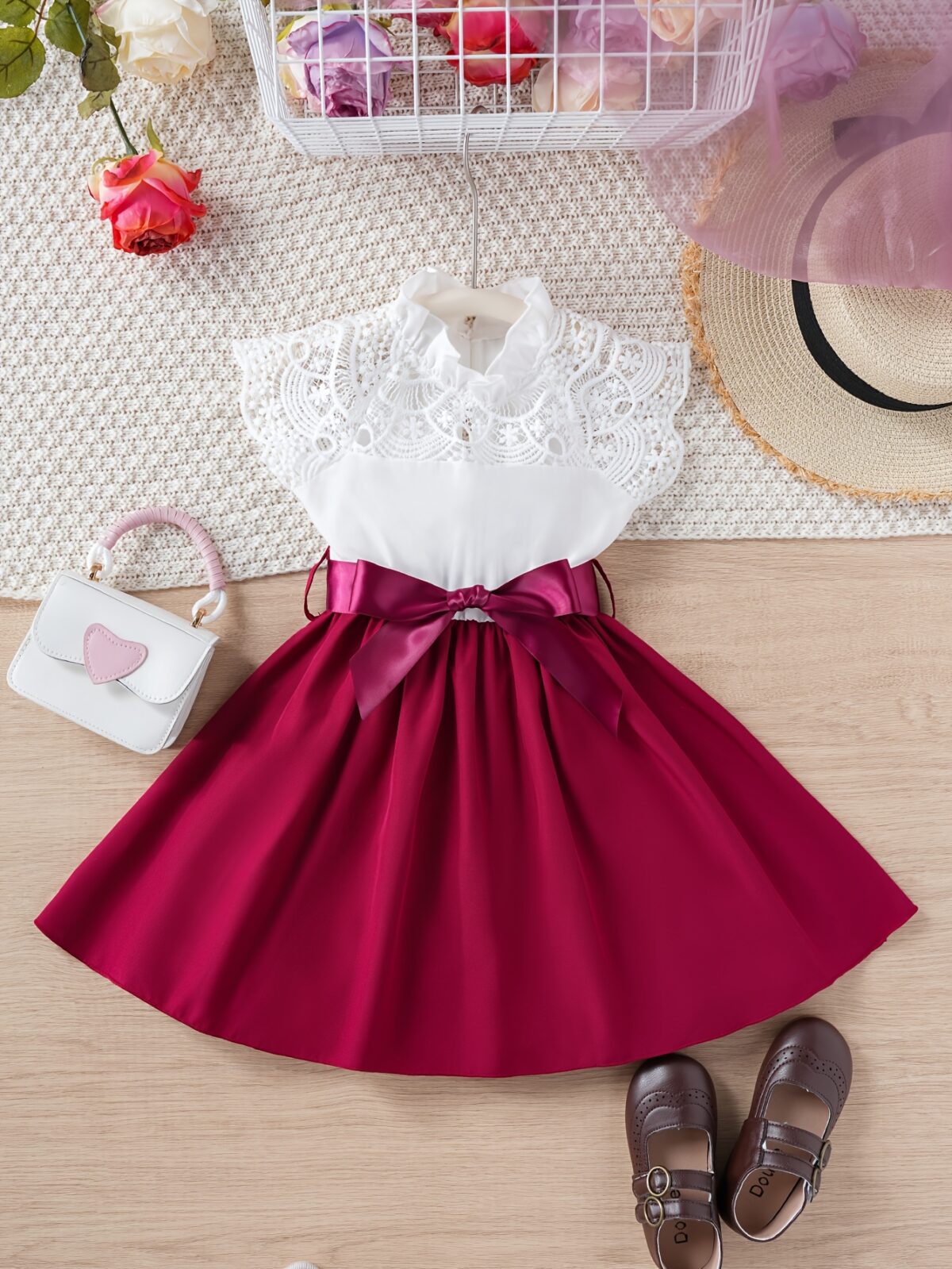 Adorable girl wearing a white Summer Bloom Lace Trim Dress showcasing its delicate lace details and summery style