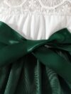 Adorable green midi dress perfect for summer styled on a girl