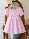 Adorable Little Darling Girls Party Dress from Newness perfect for birthdays weddings or any special occasion The dress features insert details about the dress eg a beautiful floral print sparkly sequins a flowing skirt