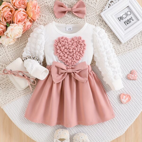Adorable red heart shaped dress and bow set for babies and toddlers from Newness Perfect for special occasions or everyday wear