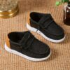Stylish and comfortable blue canvas shoes for boys perfect for everyday wear Newness brand