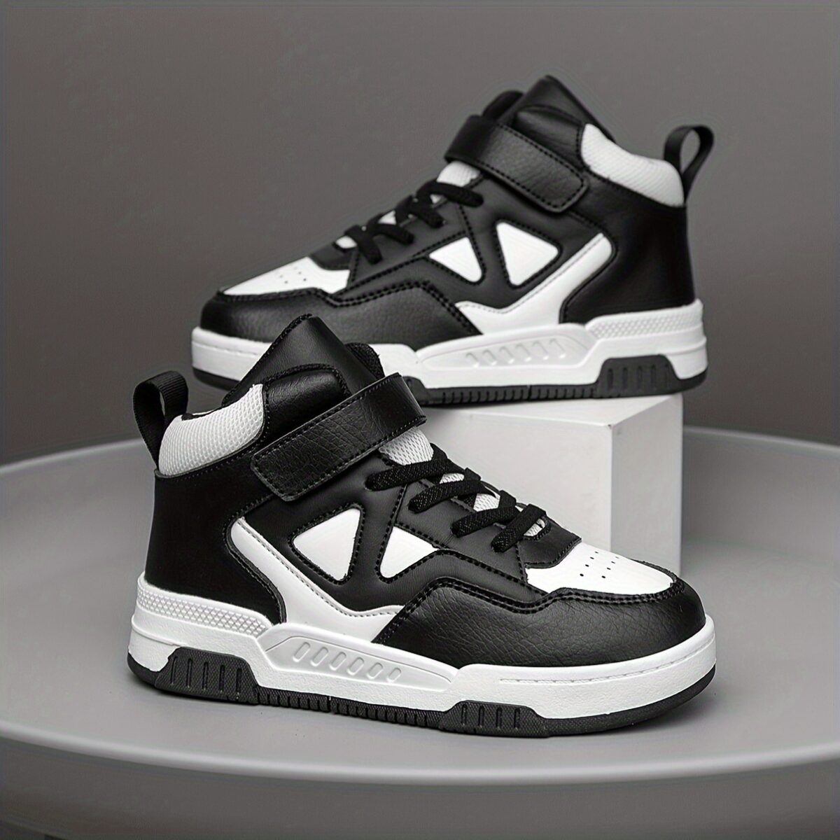 Stylish Retro Pixel Geometric Sneakers for kids by Newness These sneakers feature a vibrant geometric pixel design