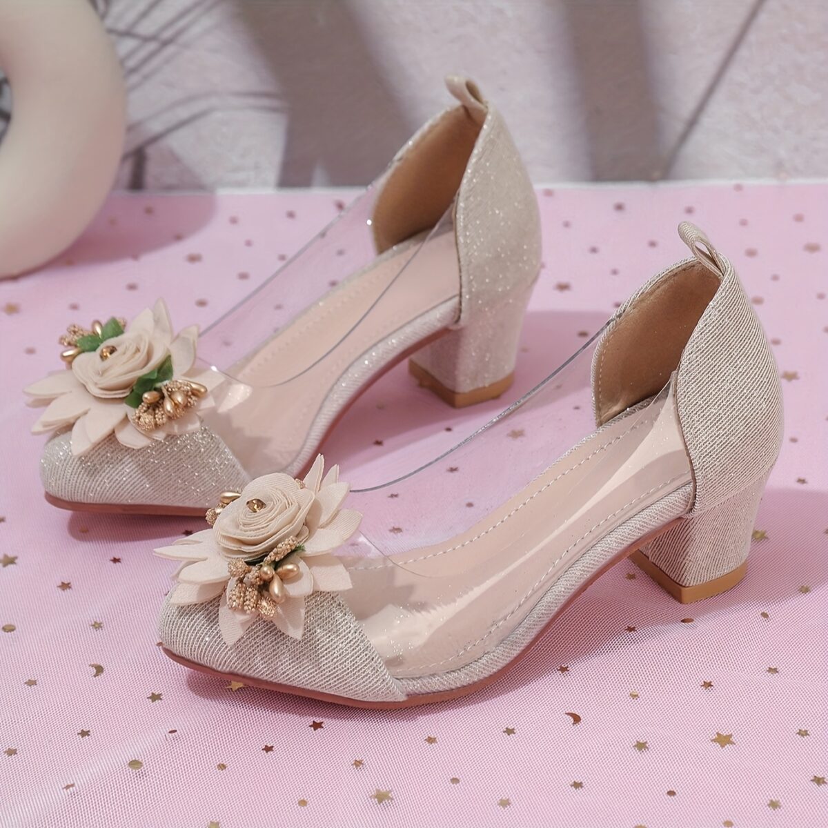 Adorable little girl wearing Newness Enchanted Garden Girls Block Heels showcasing the charming design and comfortable block heel