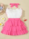Adorable toddler girl in a vibrant Summer Bloom dress perfect for summer adventures The dress features a playful floral print and comfortable breathable fabric