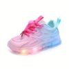 Kids BananaDeer Galaxy Glow LED Sneakers lighting up with vibrant colors