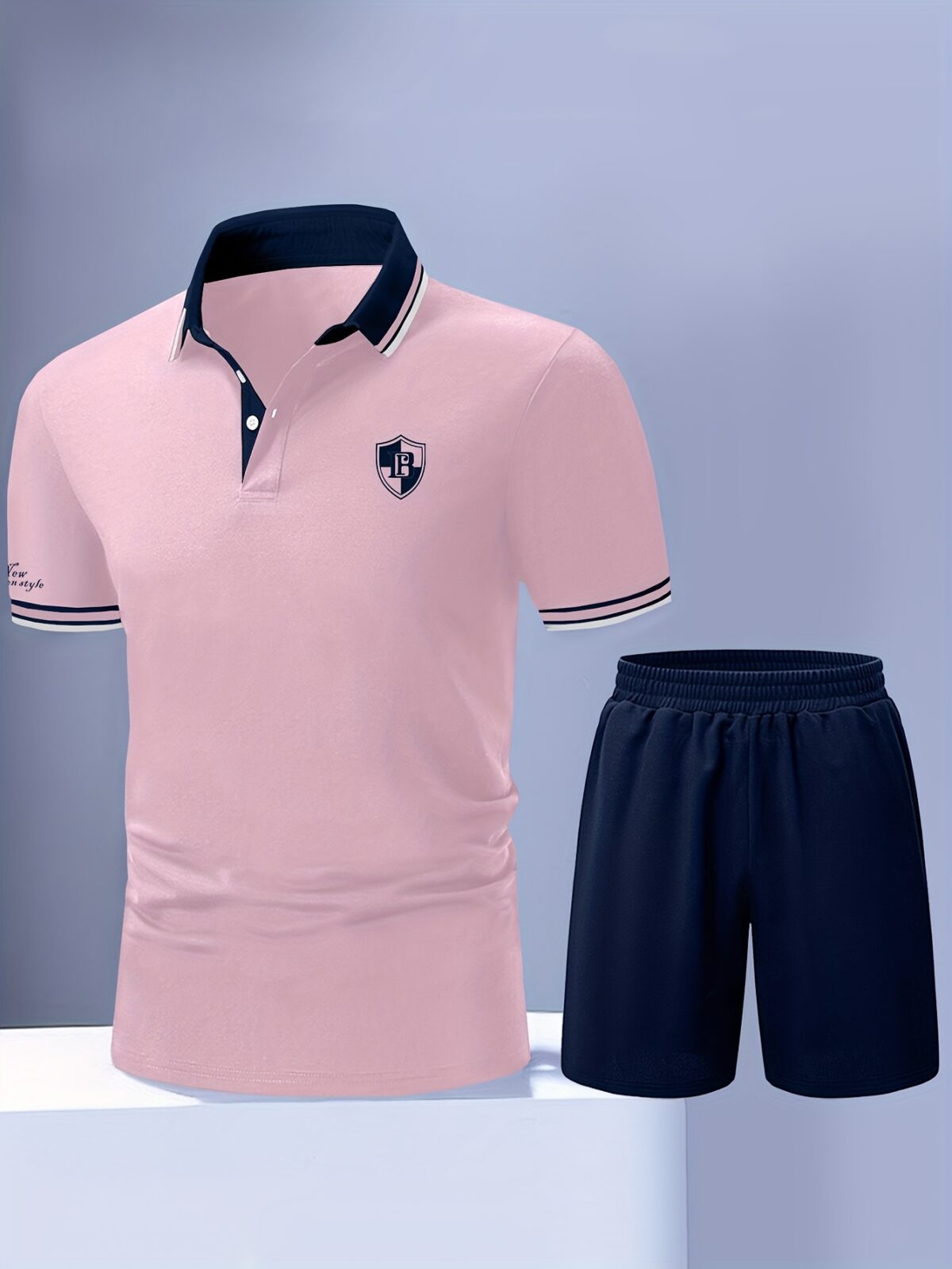 Newness Modern Mens Polo Shorts Set A stylish and comfortable polo shirt and shorts set perfect for summer The model wears the set showcasing its relaxed fit and modern design