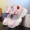 Stylish and breathable Newness Kids Striped Mesh Sneakers in action perfect for active play Showcasing the comfortable design and vibrant striped mesh