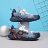 Stylish striped mesh youth sneakers perfect for active kids Breathable and comfortable design in a trendy color scheme