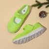 Adorable toddler wearing Newnesss Summer Breeze Sneakers running playfully outdoors on a sunny day