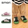 Stylish and comfortable blue canvas shoes for kids perfect for all day play Newness brand logo subtly visible