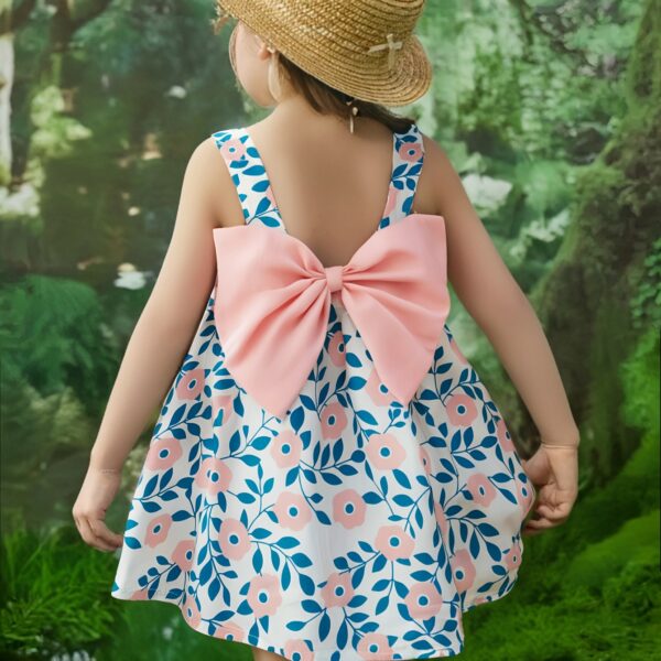 Girl wearing a charming summer floral print dress ideal for beach parties