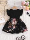 Adorable girl wearing a vibrant Summer Bloom floral print dress perfect for summer The dress features a playful colorful floral pattern