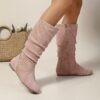 Effortlessly Chic Slouchy Boots in brown leather These stylish boots feature a slouchy fit and sleek design perfect for elevating any outfit
