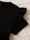 Adorable baby girl wearing a charming Little Darling Baby Bow Dress perfect for parties or playdates The dress features a beautiful bow detail