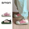 Stylish and comfortable blue canvas shoes for kids perfect for all day play Newness brand logo subtly visible