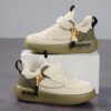 Stylish boys retro sneakers in white with colorful tassels perfect for everyday wear
