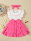 Adorable toddler girl in a vibrant Summer Bloom dress perfect for summer adventures The dress features a playful floral print and comfortable breathable fabric