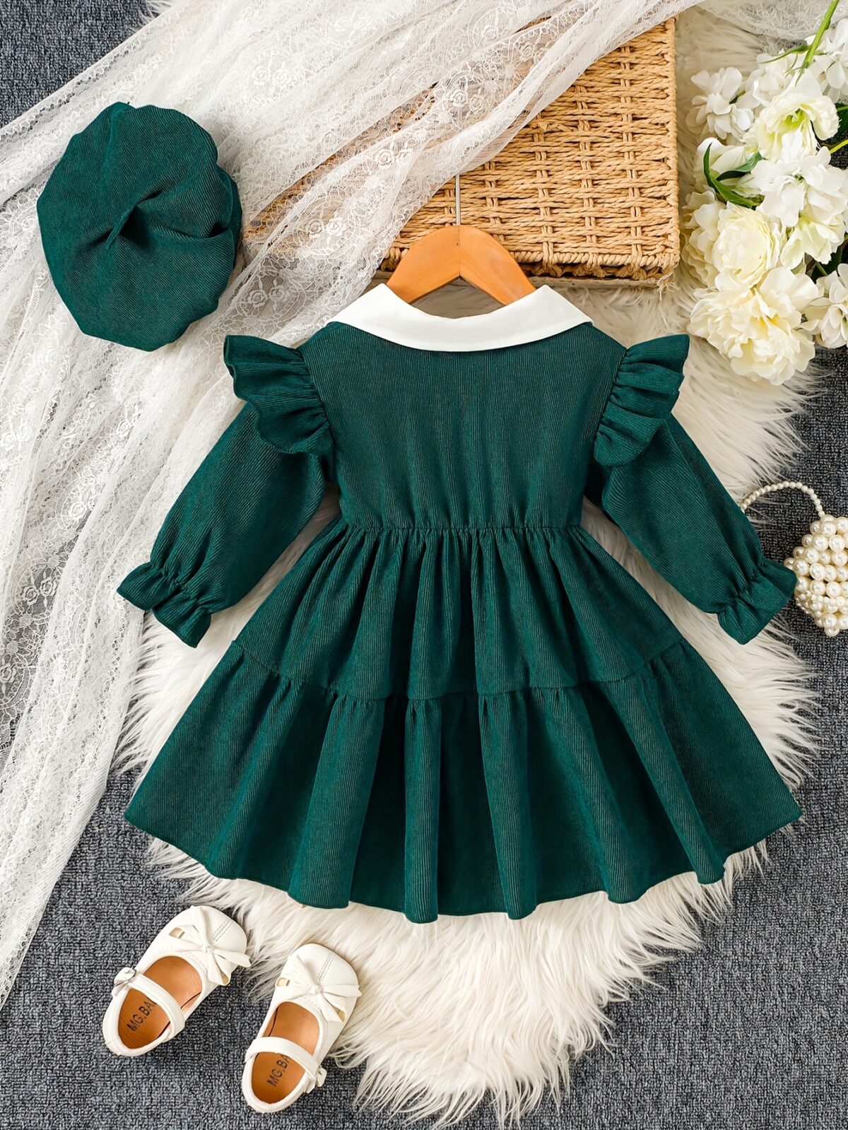 Adorable Emerald Isle doll collar dress and hat set in emerald green perfect for your little one The dress features a charming doll collar and the matching hat completes the outfit