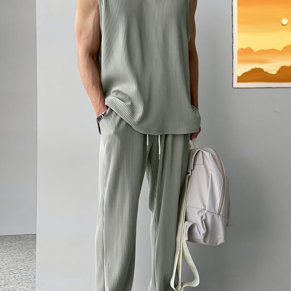 The Newness Mens Minimalist Summer Set a stylish comfortable two piece outfit perfect for summer Model wears a crisp white linen shirt and relaxed fit beige shorts