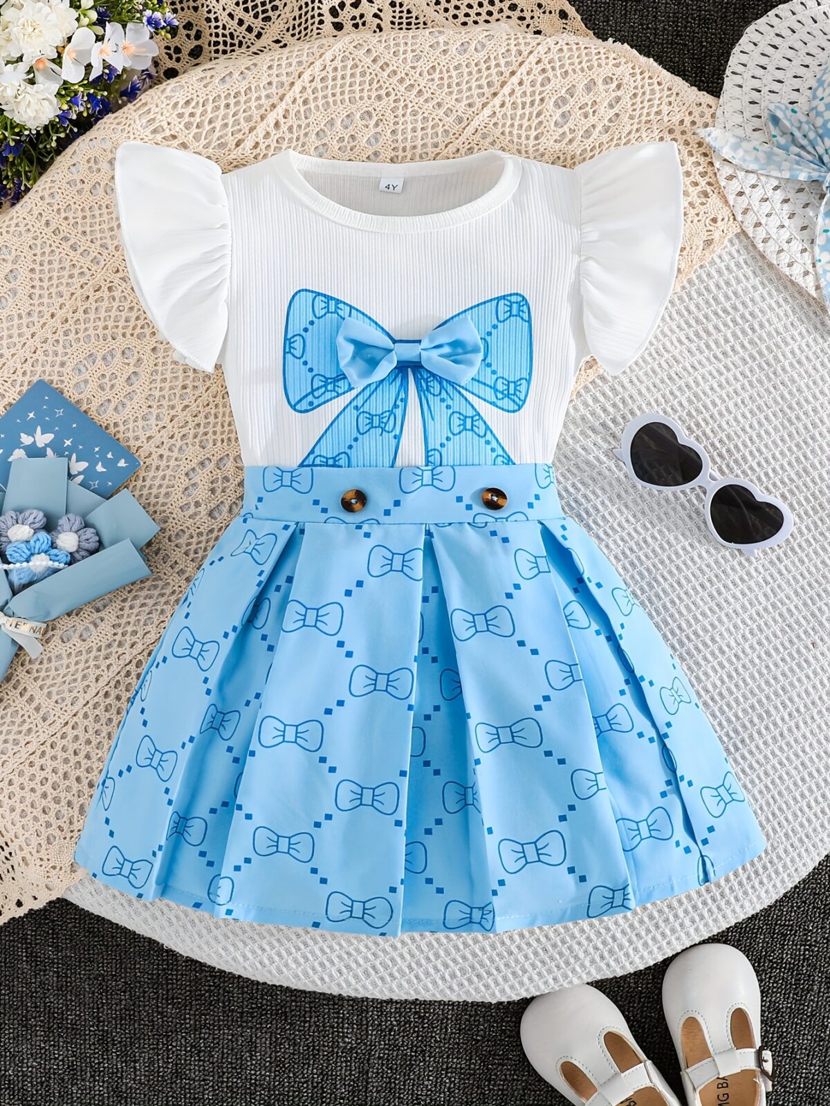 Adorable girls summer outfit Newnesss Summer Playdate Bow Skirt Set A charming two piece set featuring a stylish bow skirt and coordinating top