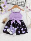 Sweetheart Summer Toddler Dress   Adorable little girl wearing a charming pink and white summer dress perfect for summer parties and outdoor play