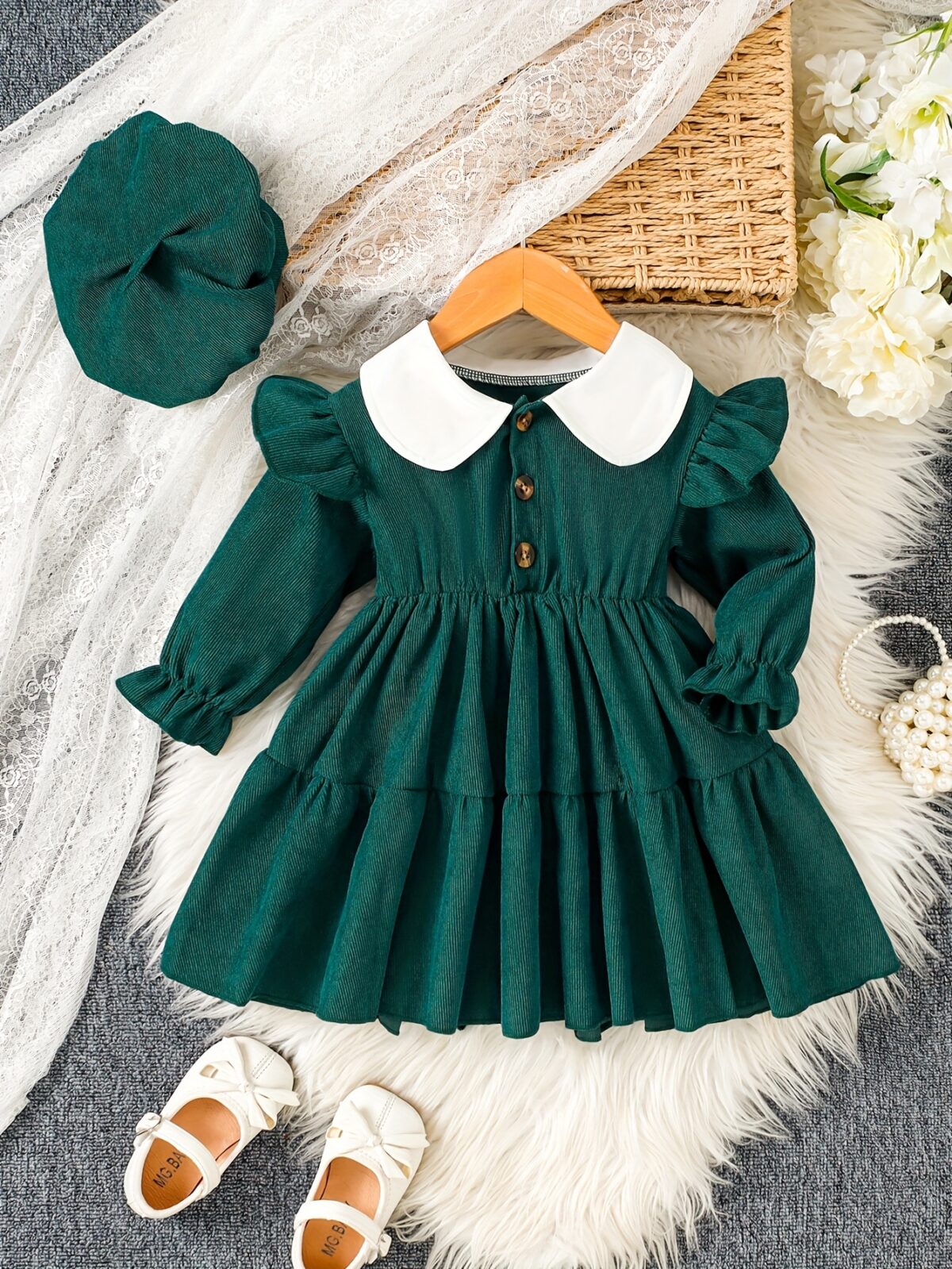 Adorable Emerald Isle doll collar dress and hat set in emerald green perfect for your little one The dress features a charming doll collar and the matching hat completes the outfit