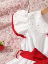 Sweet Cherry Print Dress with Bow from Newness A charming cherry printed dress with a cute bow
