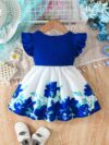 A little girl wearing a charming summer floral print dress